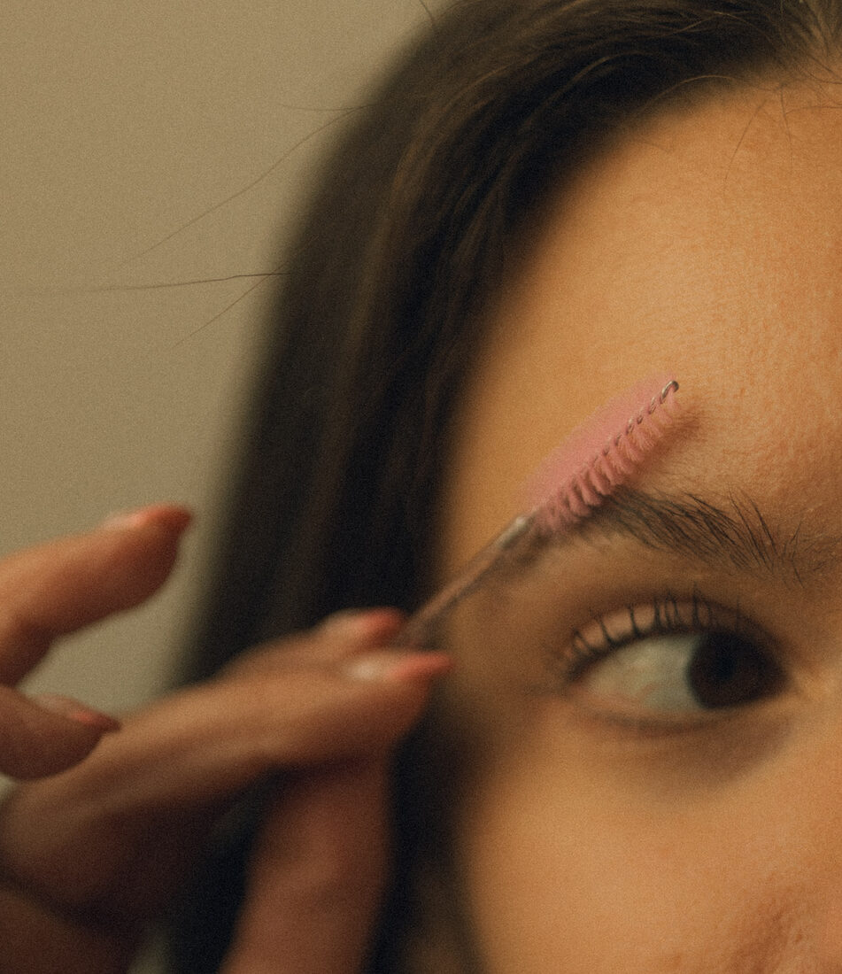 Close-up of a brow tint being carefully applied at Esthetics by Ellie